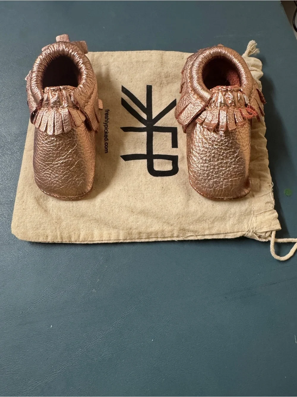 Freshly Picked Rose gold infant moccasins size 2